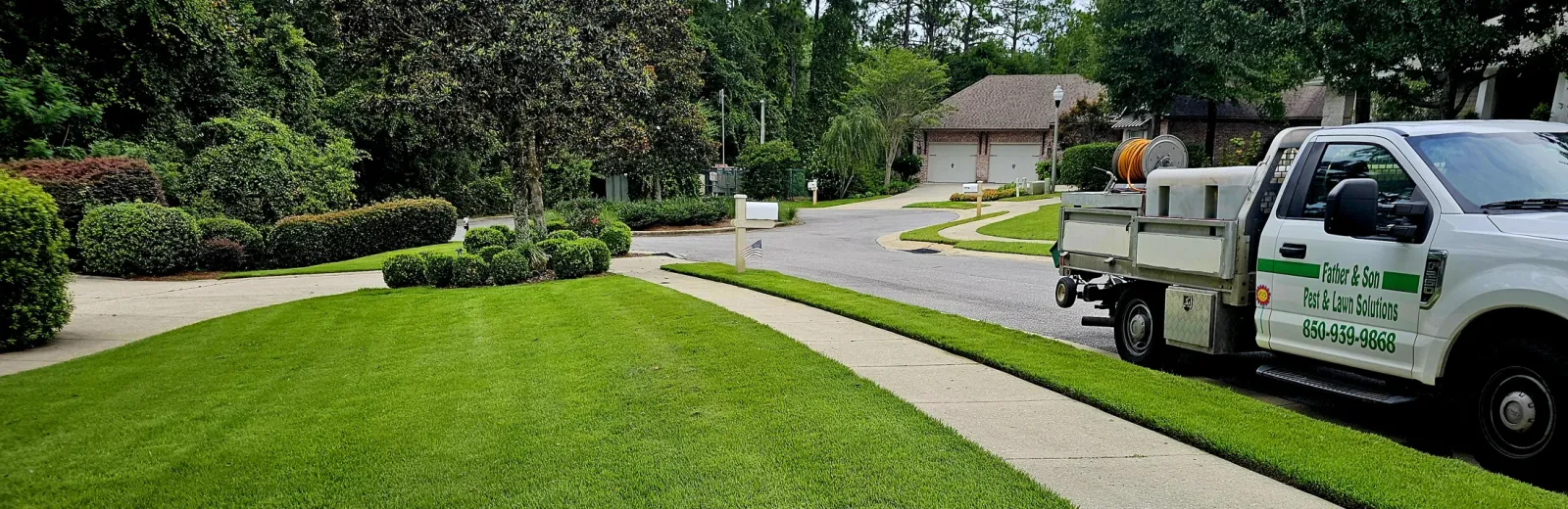 hero-lawn-father-and-son-truck